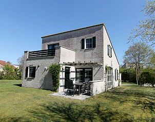 Vakantiehuis F 604 in De Cocksdorp, Texel, biedt een ruime tuin en terras voor een ontspannen verblijf op de Waddeneilanden.