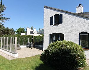 Vakantiehuis F 627 in De Cocksdorp, Texel, met zonnig terras en groene tuin, ideaal voor ontspanning op de Waddeneilanden.