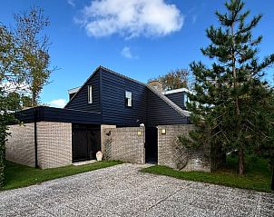 Vakantiehuis G 049 in De Cocksdorp, Texel biedt een charmante buitenkant met moderne architectuur en groene omgeving op de Waddeneilanden.