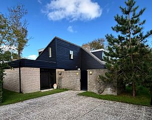 Vakantiehuis G 049 in De Cocksdorp, Texel biedt een charmant verblijf met moderne architectuur en een groene omgeving op de Waddeneilanden.