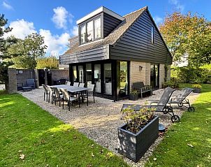 Vakantiehuis G 049 in De Cocksdorp, Texel, met zonnig terras en ruime tuin, ideaal voor ontspanning op de Waddeneilanden.