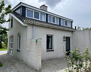 Vakantiehuis F 765 in De Cocksdorp, Texel, biedt een charmant verblijf met moderne architectuur en een rustige omgeving op de Waddeneilanden.