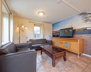 Ontspan in de gezellige woonkamer van Tongelen R.D. van, vakantiehuis in De Cocksdorp, Texel, Waddeneilanden.