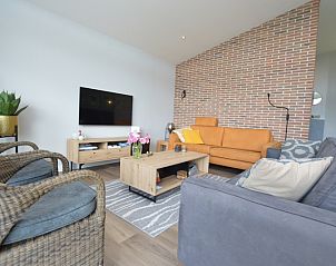 Gezellige binnenruimte van Orchismient 49, vakantiehuis in De Koog, Texel met moderne inrichting.