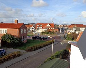 Uitzicht vanaf Appartementen Anna - Noorderlicht - 13 in De Koog, Texel, met zicht op de charmante omgeving.