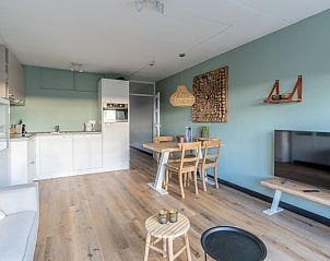 Open keuken en eetruimte in Appartement Juliana 140 Eiland en Zeezicht, De Koog, Texel voor een comfortabele vakantie.