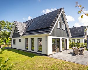Villa 17 in De Koog, Texel, Ferienhaus mit Sonnenterrasse und grner Umgebung auf den Watteninseln.