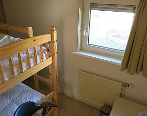 Kinderkamer met stapelbed in Bungalow 't Luwe Land 49 De Koog Texel, ideaal voor gezinnen die de Waddeneilanden willen verkennen.