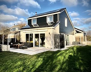 Stappeland - Huize 100-1 in De Koog, Texel, biedt een ruime tuin en terras voor een perfecte vakantie op de Waddeneilanden.