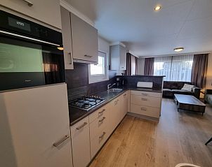 Modern kitchen in Chalet Bregkoog 103 on Chaletpark Bregkoog, De Koog, Texel with open living area.