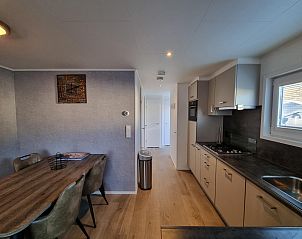 Cozy dining area in Chalet Bregkoog 103 on Chaletpark Bregkoog, De Koog, Texel.