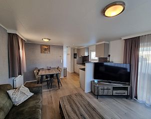 Chalet Bregkoog 103 on Chaletpark Bregkoog in De Koog, Texel with stylish living room and TV.