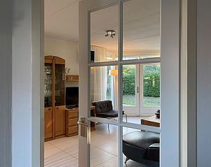 Stijlvolle woonkamer van Residentie Californi - Vakantiehuis 367 in De Koog, Texel, biedt comfort en gezelligheid.