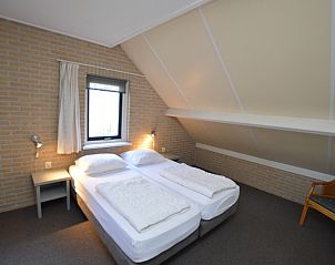 Komfortables Schlafzimmer im Obergeschoss des Ferienhauses Stappeland 207, De Koog, Texel.