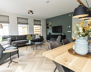 Stylish living room of Villa 39 in De Koog Texel with comfortable furniture.