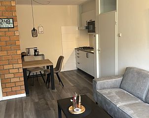 Offene Kche und Essbereich im Apartment Kerckeland 40, De Koog, Texel mit moderner Einrichtung.