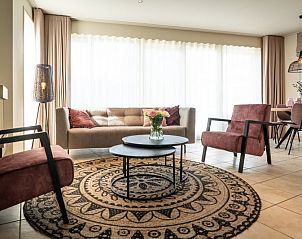Stylish sitting area in Bungalow 31, De Koog, Texel with lots of natural light.