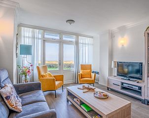 Gemtliches Wohnzimmer mit Aussicht im Appartement Juliana 058 Zeezicht, De Koog, Texel.