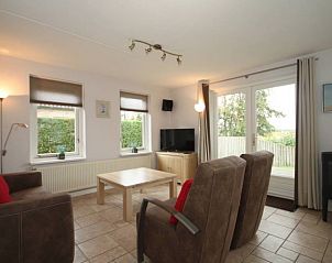 Gezellige zitruimte in Waddenstaete 4 pers. Wellness villa, De Koog, Texel. Vakantiehuis met veel lichtinval op de Waddeneilanden.