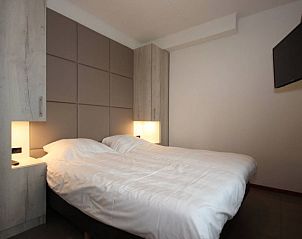 Slaapkamer met tweepersoonsbed in Landleven 4/5 pers. vakantiehuis, De Koog, Texel, Waddeneilanden, voor een rustgevende nachtrust.