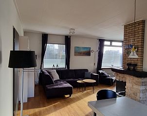 Gerumiges und helles Wohnzimmer des Ferienhauses Orchismient 55 in De Koog, Texel.