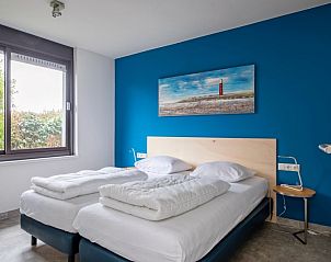 Comfortabele slaapkamer in Orchismient 20, De Koog vakantiehuis met uitzicht op Texel, Waddeneilanden.