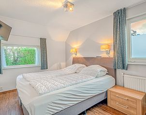 Slaapkamer in Vakantiehuis Kamperfoelie 51, De Koog, Texel met comfortabel tweepersoonsbed.
