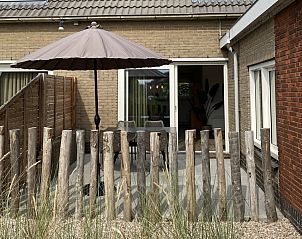 Terrasse mit Blick auf den Garten in De Boomleeuwerik, Ferienunterkunft auf Texel.
