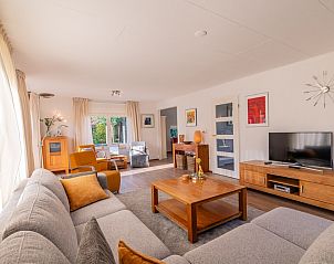 Spacious living room in Holiday home Honeysuckle 61, De Koog, Texel, Wadden Islands.