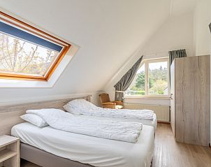 Bedroom with skylight in Holiday home Honeysuckle 61, De Koog, Texel, Wadden Islands.