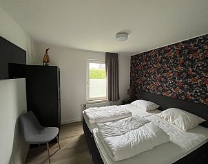 Komfortables Schlafzimmer in De Duinven, De Koog, Texel, mit moderner Einrichtung und ruhigem Ambiente.