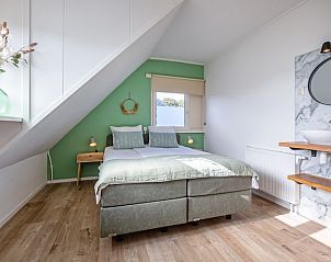 Comfortabele slaapkamer in De Veldleeuwerik vakantiehuis, De Koog, Texel, Waddeneilanden.