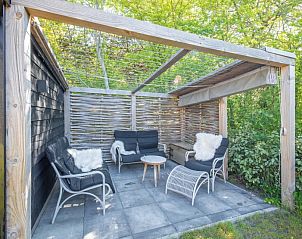 Gezellige buitenlounge bij vakantiehuis Hoog Koog 19, Bungalowpark Hoog Koog, De Koog, Texel.
