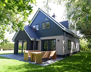 06 - Razende Bol - allotment vacation home with terrace in De Koog, Texel surrounded by greenery.