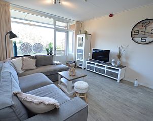 Gemtliches Wohnzimmer des Appartements Kerckeland 78 in De Koog, Texel mit bequemem Sofa und moderner Einrichtung.