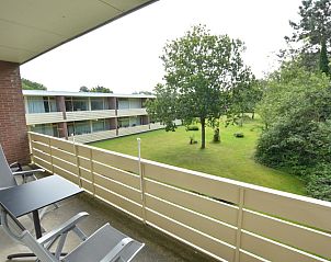 Balkon met uitzicht op groen in Appartement Kerckeland 126, De Koog, Texel.