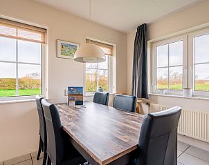 Eethoek met landelijke uitzichten in Vakantiehuis in De Koog, Texel