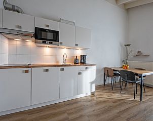 Stilvolles Badezimmer im Motel Texel Apartment, De Koog, Texel mit modernen Annehmlichkeiten fr hchsten Komfort.