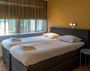 Comfortabele slaapkamer in vakantiehuisje in De Koog, Texel, Waddeneilanden.