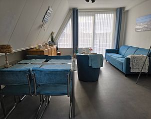 Gezellige binnenruimte van Appartementen Anna - Appartement 15 in De Koog, Texel. Comfortabele zithoek.