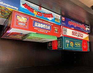 Gezelschapsspellen in De Strandvondst vakantiehuis in De Koog, Texel.