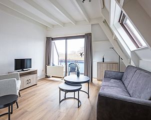 Bright living room in Two persons apartment large - second floor in De Koog, Texel, overlooking nature.