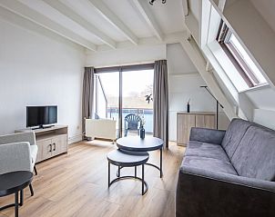 Cozy sitting area in Two persons apartment large - second floor, De Koog, Texel, with modern furnishings.