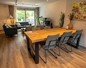 Gemtliches Wohnzimmer in Landgoed Springtij - Stulpje, De Koog, Texel mit bequemen Sitzgelegenheiten.