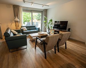 Landgoed Springtij - Stulpje in De Koog, Texel mit hellem Wohnzimmer und Gartenblick.