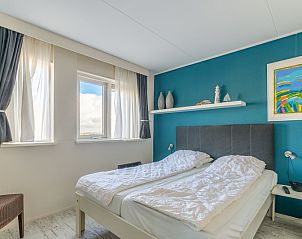 Gerumiges Schlafzimmer im Apartment Juliana 148 Insel- und Meerblick, De Koog, Texel mit Blick auf die Natur.