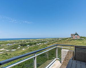 Atemberaubende Aussicht vom Balkon des Appartements Juliana 168 Zeezicht in De Koog, Texel, mit Blick auf das Meer und die Dnen.