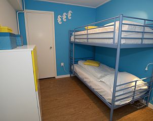 Kinderkamer met stapelbed in Grand Hotel Opduin - Vakantiewoning C, De Koog, Texel. Gezinsvriendelijk vakantiehuis op de Waddeneilanden.
