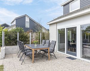 Ruim terras bij Stappeland - De Groene Boei, vakantiehuis in De Koog, Texel, ideaal voor buiten dineren.