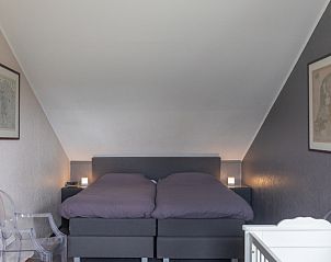 Knusse slaapkamer in Stappeland - De Groene Boei, vakantiehuis in De Koog, Texel, met comfortabel tweepersoonsbed.